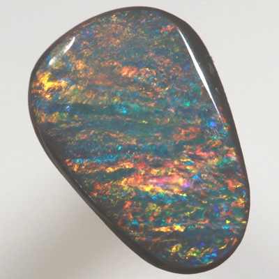 SOLID BLACK OPAL Bands of red and orange over turquoise blue